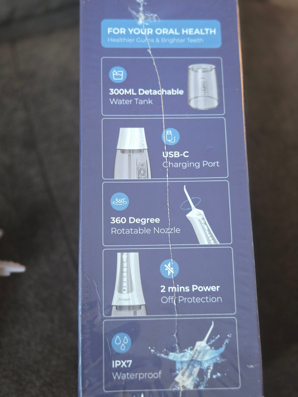 Portable oral irrigator